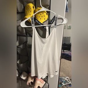 white nike tank! dri fit! back is pretty open!